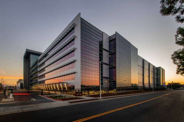 Glass office building at sunset